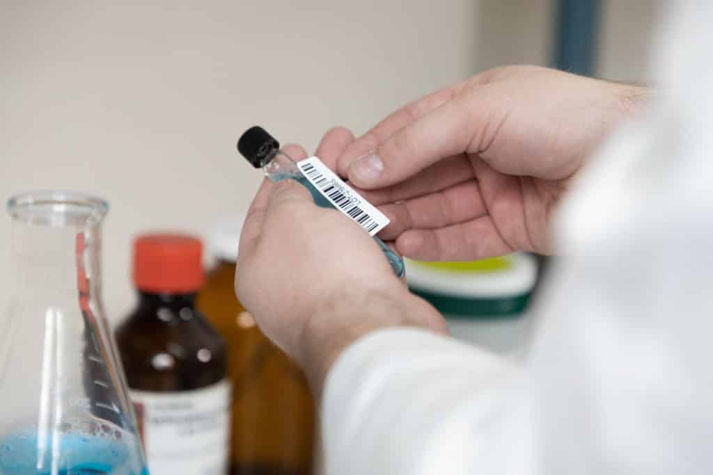 healthcare lab label applied to tube